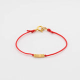 RED STRING BRACELET