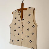 THE BLUE FLOWER VEST