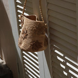 EMILIE ROUND RAFIA BAG - NATURAL